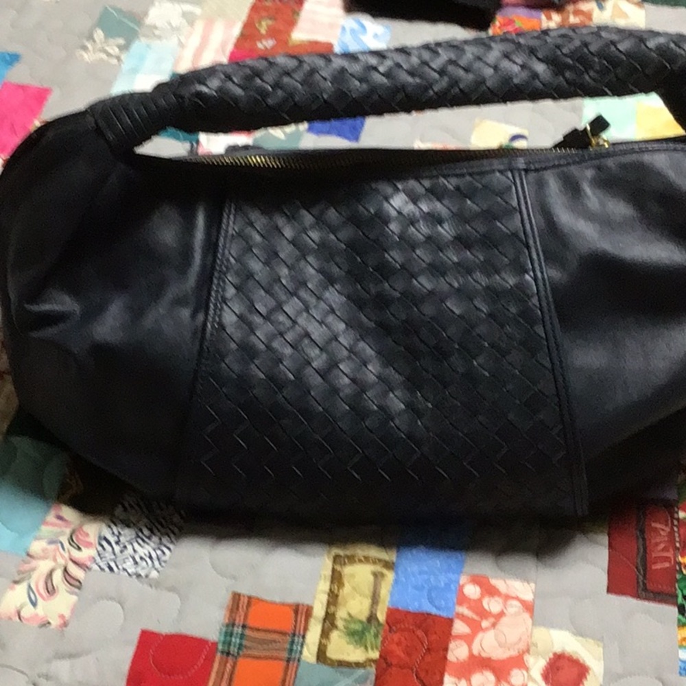 Large woven leather .navy bag.